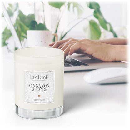 Cinnamon and Orange Soy Wax Candle placed up on desk